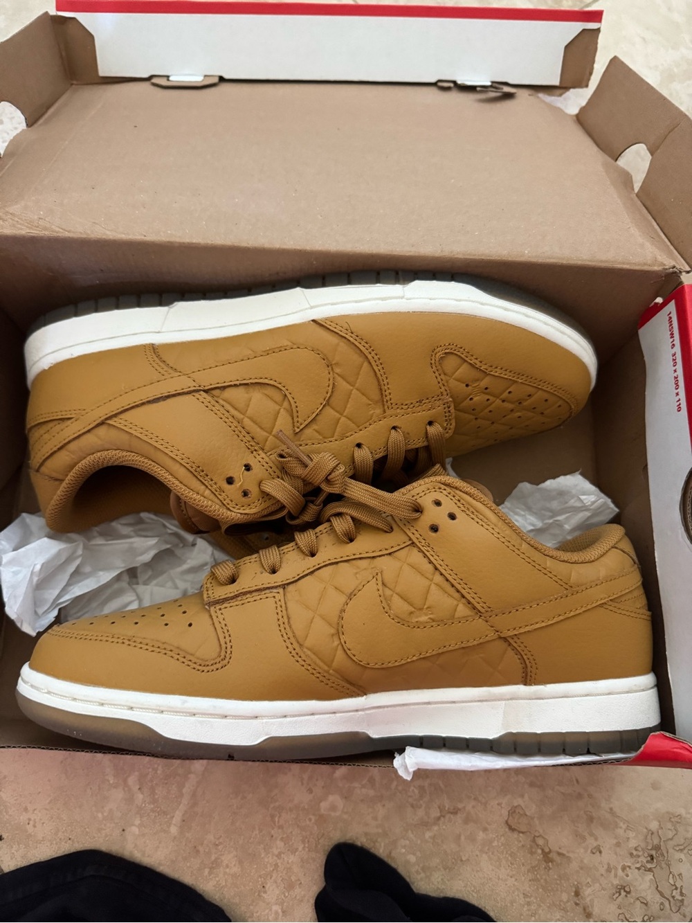Nike women’s Nike Dunk in Wheat Brown